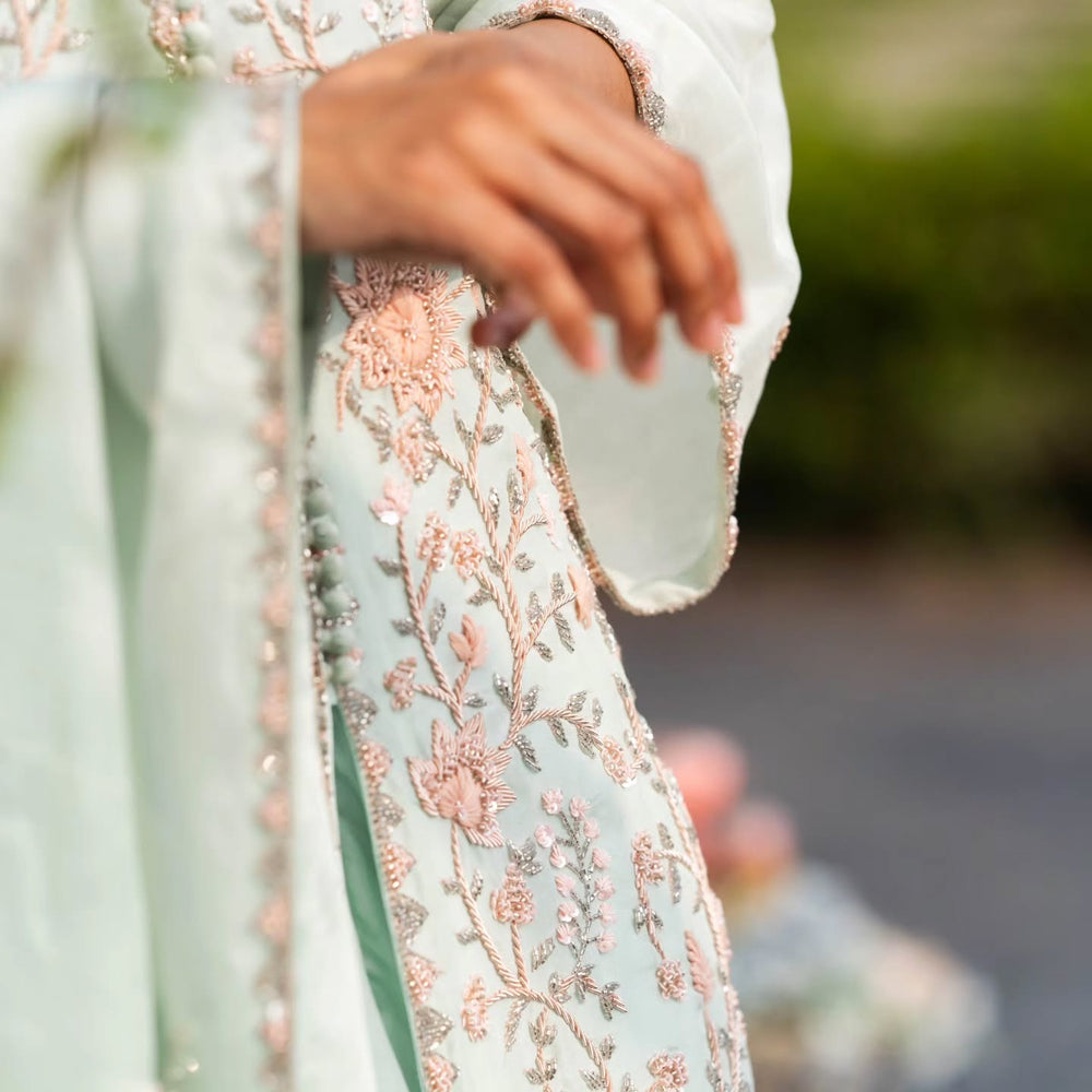 Light green upada silk peplum top with heavy satin lehenga pallazo