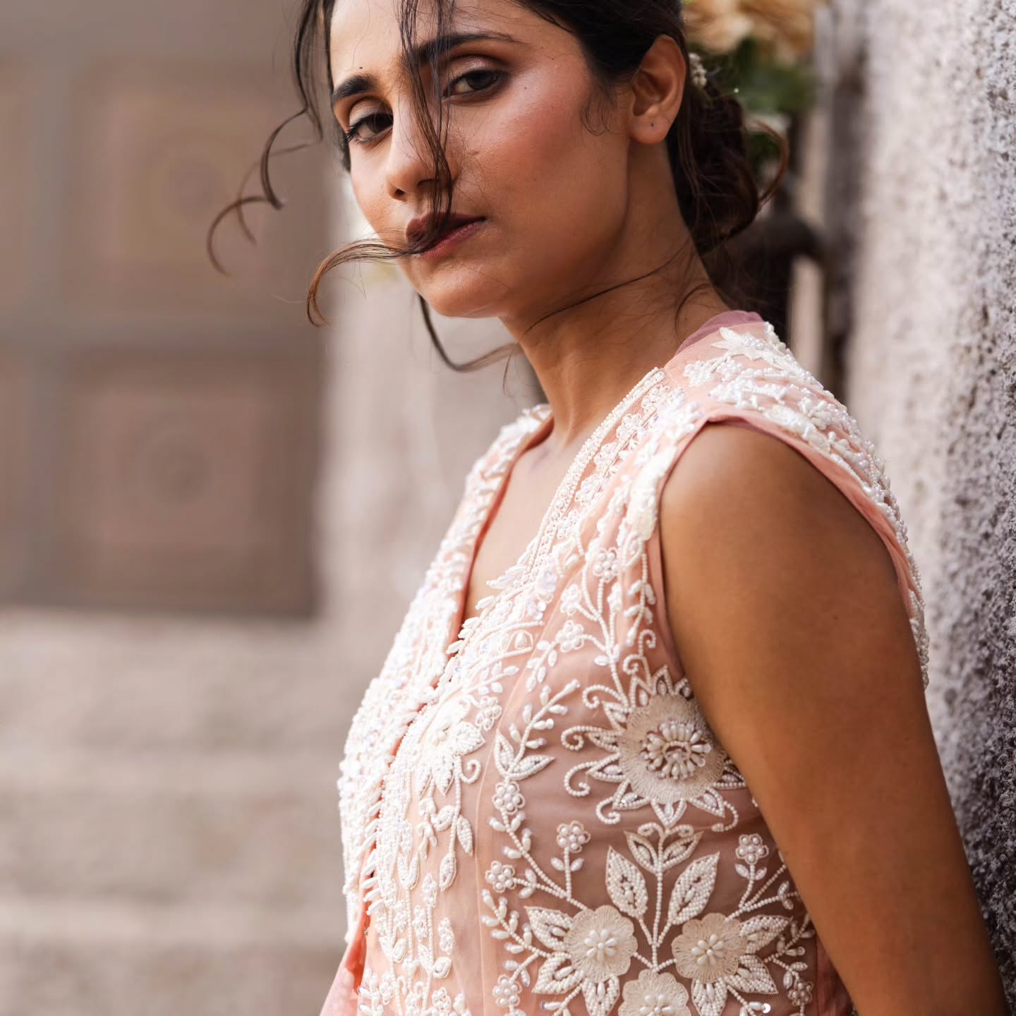 Peach taiwan net peplum top with flat chiffon lehenga pallazo