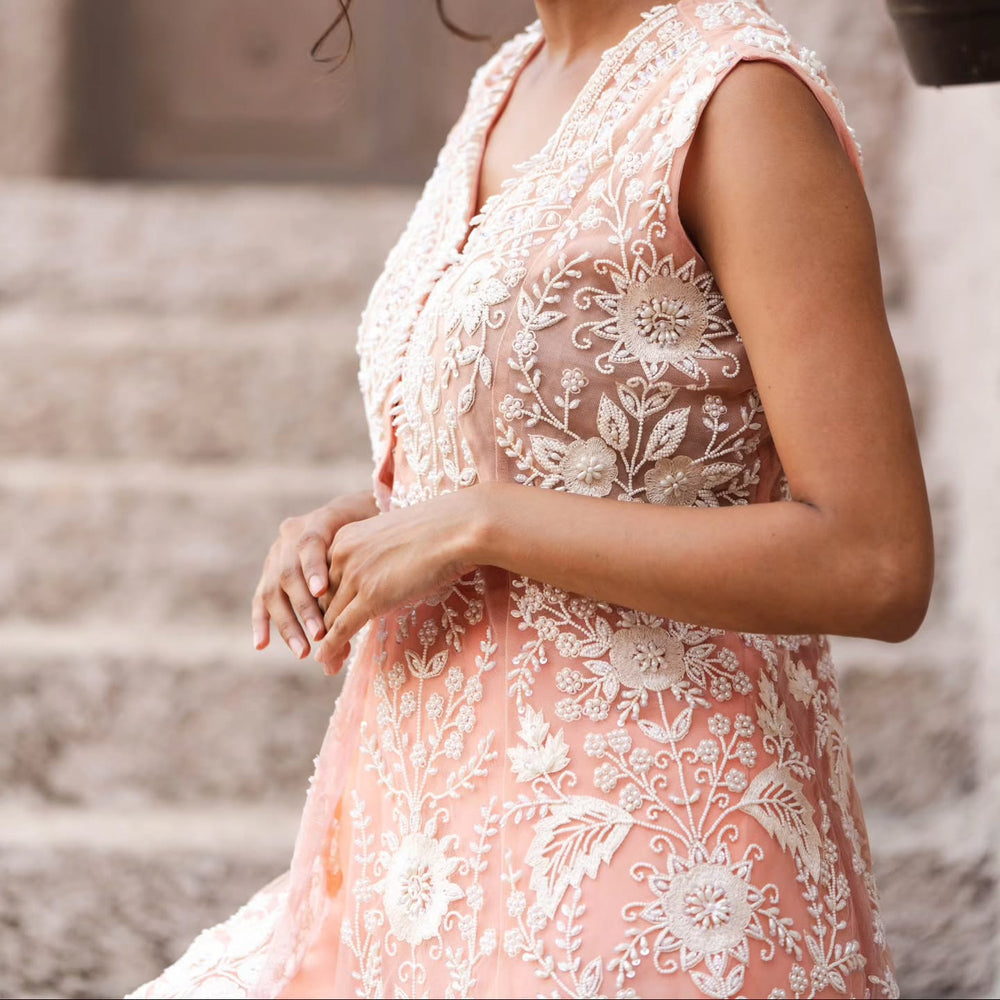 Peach taiwan net peplum top with flat chiffon lehenga pallazo