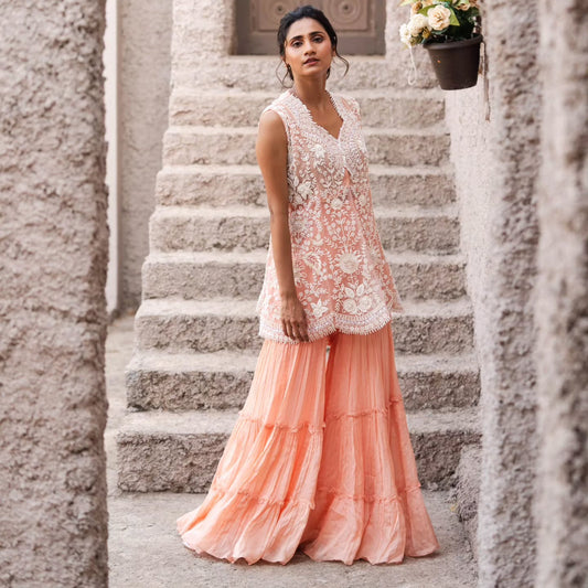 Peach taiwan net peplum top with flat chiffon lehenga pallazo