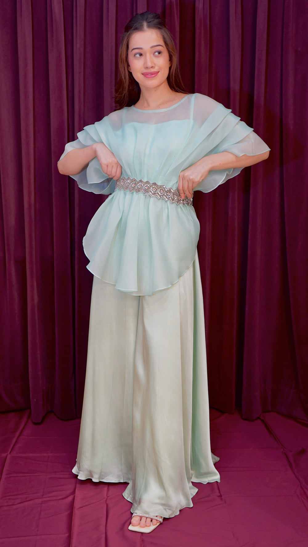 Pastel green top with flared bottoms