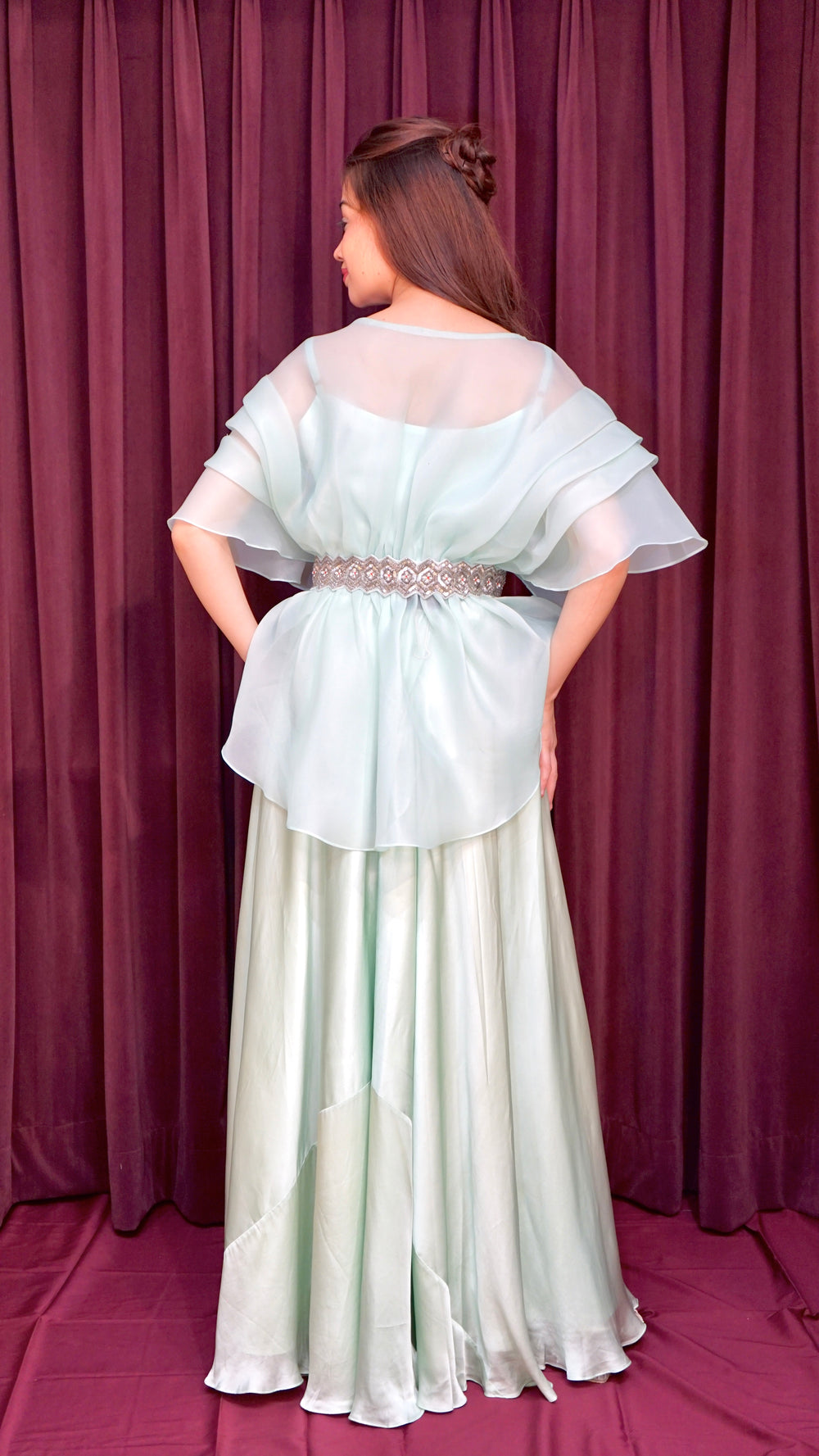 Pastel green top with flared bottoms