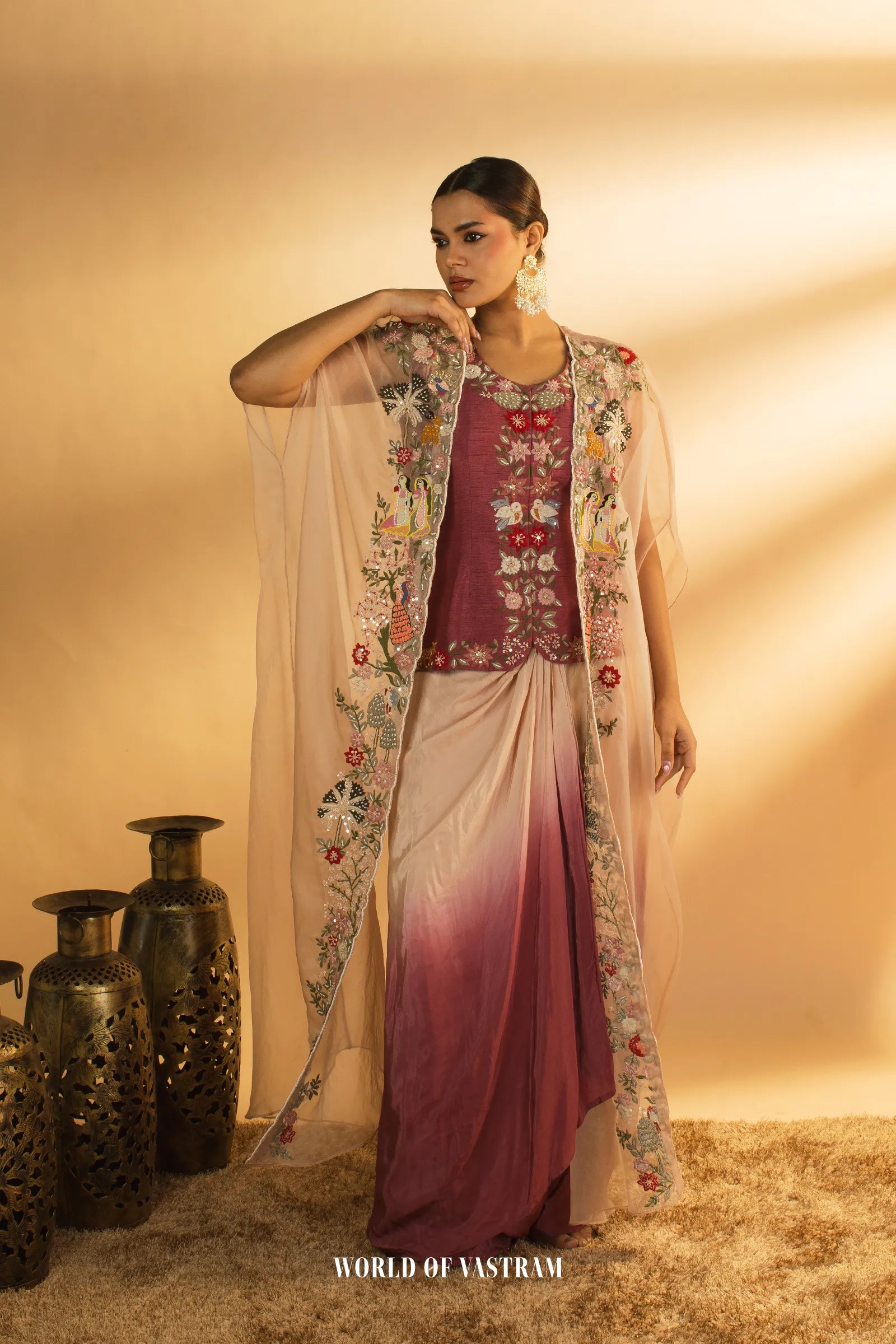 Embroidered Drape with Statement Cape