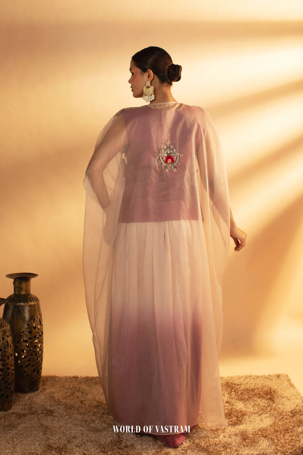 Embroidered Drape with Statement Cape