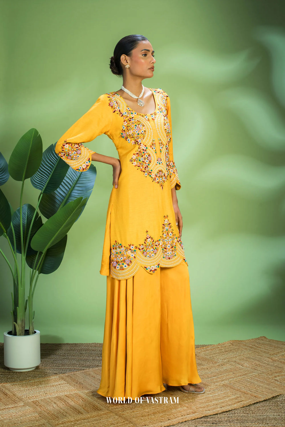 Yellow dupien silk peplum top with satin organza lehenga pallazo