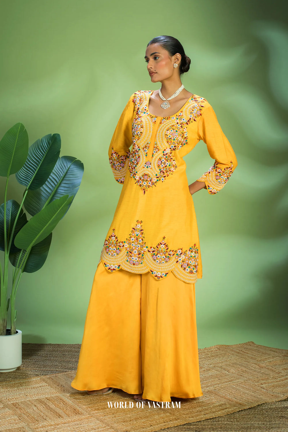 Yellow dupien silk peplum top with satin organza lehenga pallazo