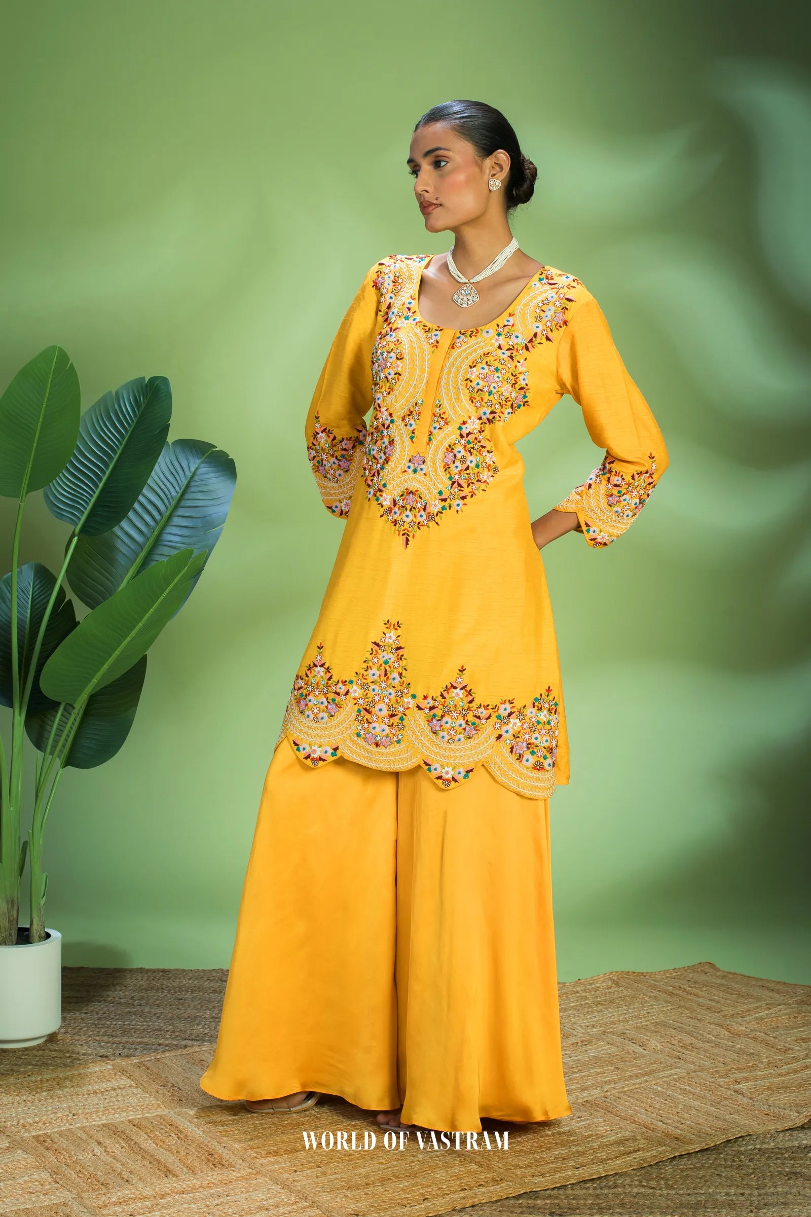 Yellow dupien silk peplum top with satin organza lehenga pallazo