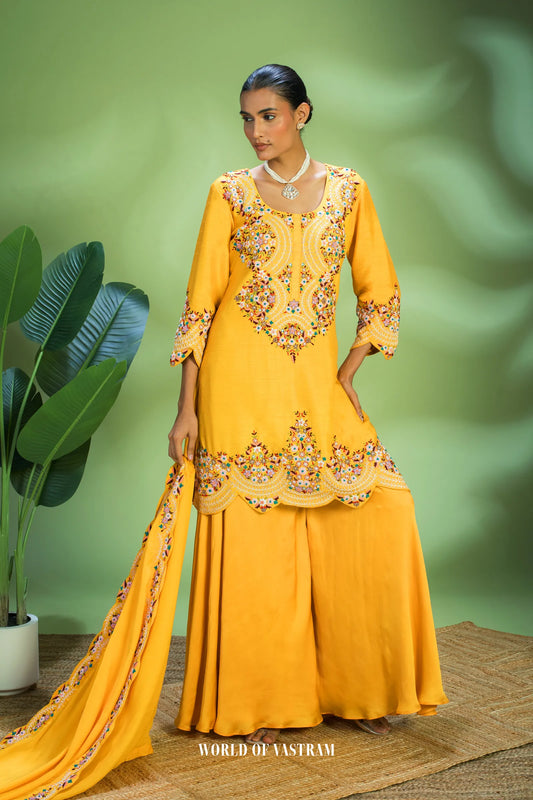 Yellow dupien silk peplum top with satin organza lehenga pallazo