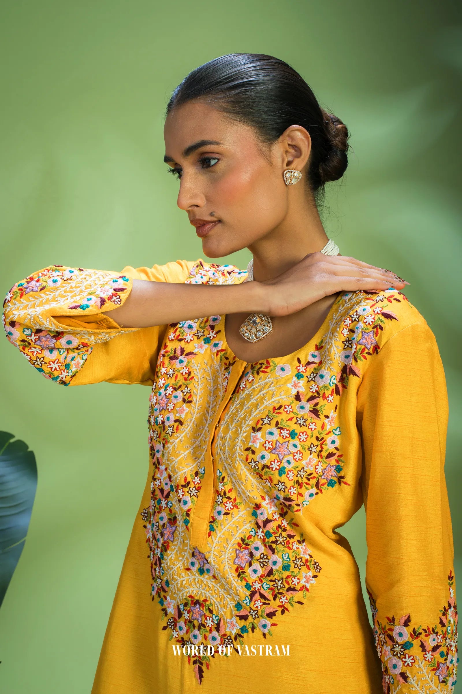 Yellow dupien silk peplum top with satin organza lehenga pallazo