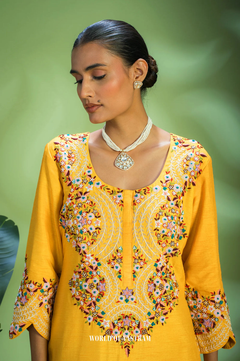 Yellow dupien silk peplum top with satin organza lehenga pallazo