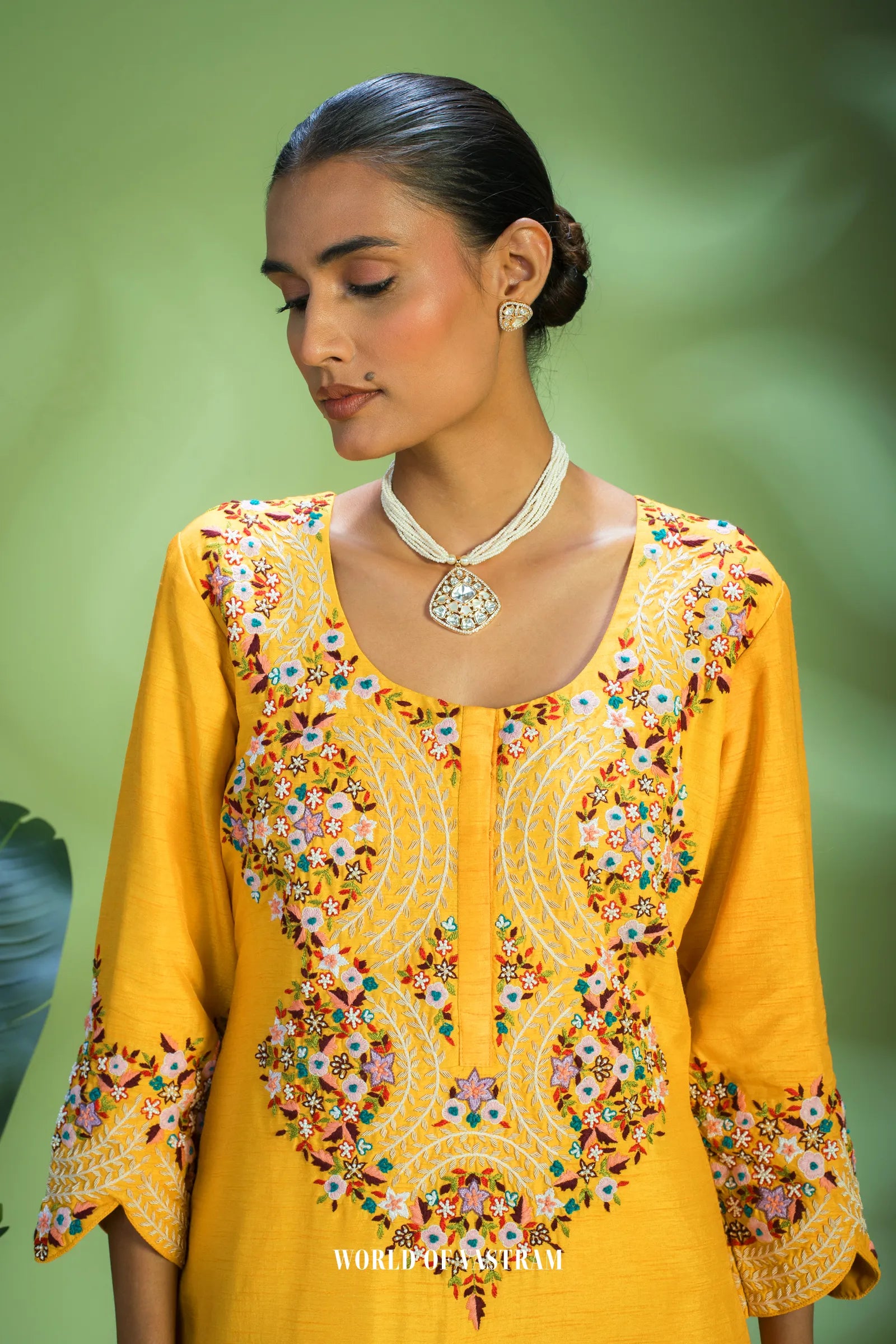 Yellow dupien silk peplum top with satin organza lehenga pallazo